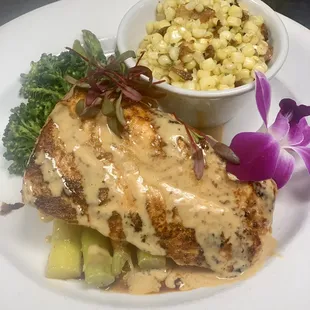 &quot;Hibachi&quot; Roasted Salmon, topped with. Red-Miso + Yuzu Crème. Paired with your choice of two sides.