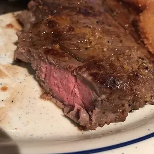 Rare steak. More medium rare/rare to me but very tasty.