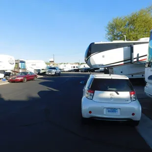 Trucks blocking street &amp; spaces