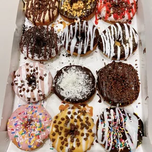 Assort of dozen donuts