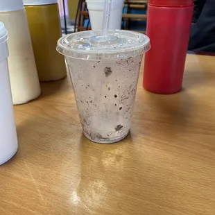 a drink in a plastic cup