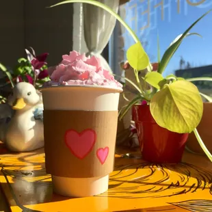 a cup of coffee on a table