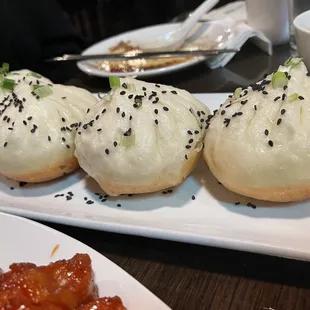 Pan Fried Pork Buns (4) for $13.95. Basically a larger xiao long bao soup dumpling in a bao form