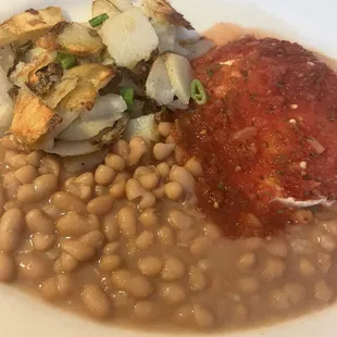Huezos rancheros. Bean and potatoes needed more flavor. Salsa was good.