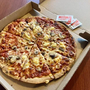 Large pizza (they have M, L, XL).  It&apos;s a conveyor belt pizza made by teenagers, but it is CRISP with good ingredients.