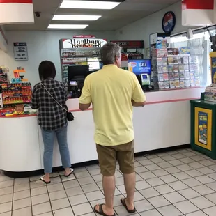 a man and a woman in a store