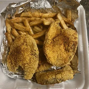 Catfish steak dinner with fries