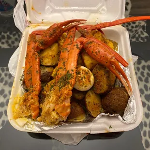 Snow Crab 1/2 Order Platter with potatoes and corn