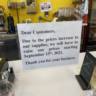 a sign on the counter