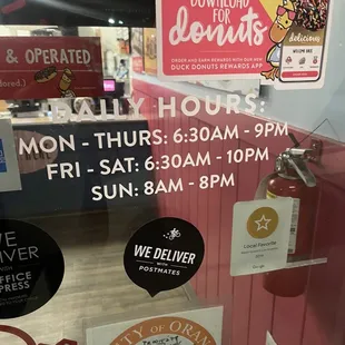 Hours posted outside business.