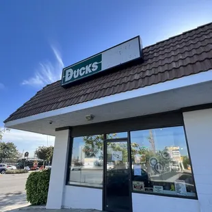 Outside. They are very low key hidden in a really quiet place. Very easy to parking tho.