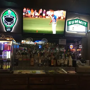 a bar with a television in the background