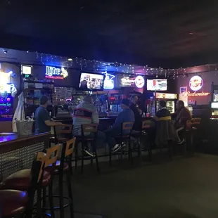 people sitting at the bar