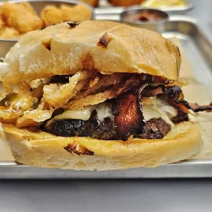 Burger with jalapeno bacon and fried onion straws
