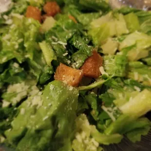 Ceaser salad is dressed nice and light. If you prefer it heavier, they'll bring you more dressing.