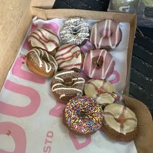 a variety of donuts in a box