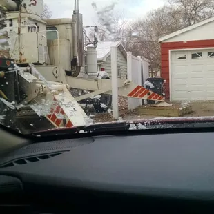 a view of a garage from inside a car