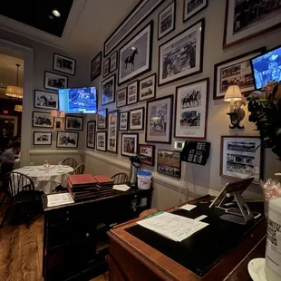 Horse pictures in the wall. Nice place.