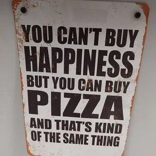 you can buy happiness but you can buy pizza and that's kind of the same thing