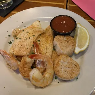 Seafood platter--super delicious! Only wish we could split the cooking styles