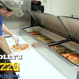 Every Dudley&apos;s Pizza is Handmade!