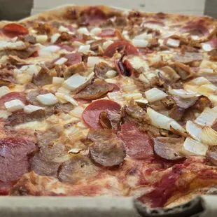 Sausage, pepperoni and onion.  Very good, crust was great