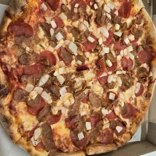 Sausage, pepperoni and onion.  Pizza was huge