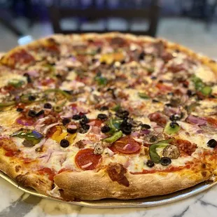 28" Supreme Pizza NY style pizza Mama Mia! Best pizza I've had since I lived in NYC! Word To your mother! Get it! :)...