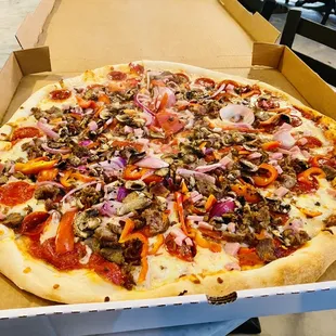 28 inch Supreme Pizza to go! Right in my yeti cooler to take home! The best authentic NY style pizza outside NY! get it! :)...