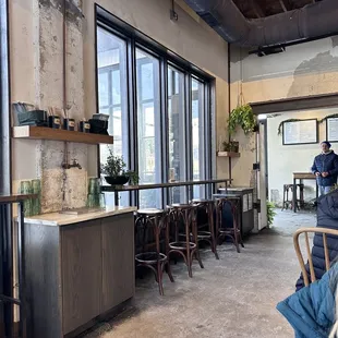 a man standing in a restaurant