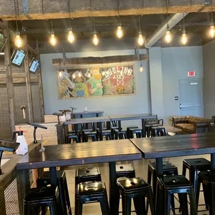 a long table with six stools