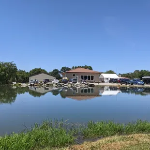 Looking at the Brewery from chairs around the lake.
