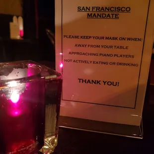 Mask mandate sign on tables