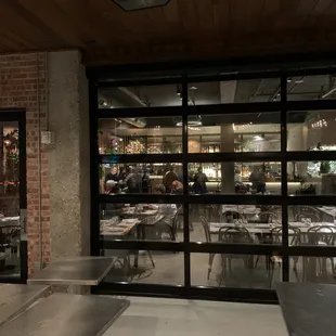 Peering inside from the outdoor seating area