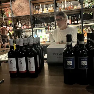 Chef-Owner Tuck Curran is opening up bottles for tonight&apos;s wine dinner.