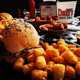a burger and tater tots