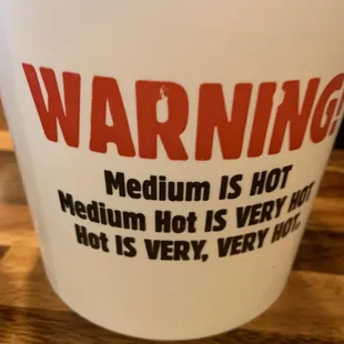 a warning cup