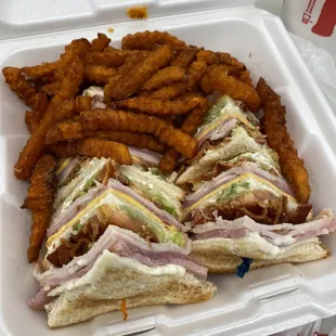 Club sandwich with side of sweet potato fries... both was so good!