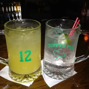 a glass of lemonade and a glass of lemonade