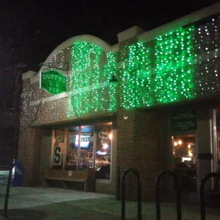 the exterior of the restaurant at night