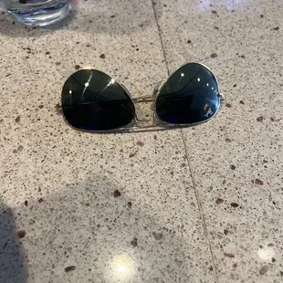 a pair of sunglasses on a table