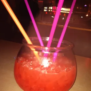 a drink with straws in a glass