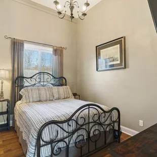 Beautiful Queen bed in Sugar Berry Suite.