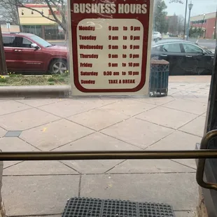 a business hours sign
