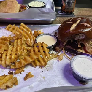 a tray of fries and a burger