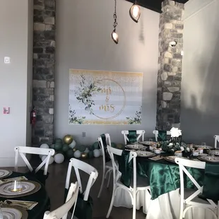 Winery room - decorated by us, tables and chair provided ($) by venue. Linens not included