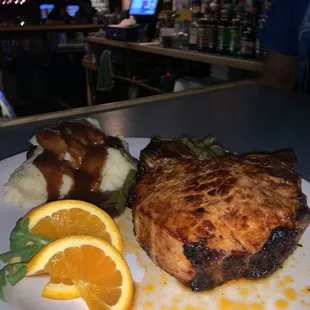 a plate of food on a bar counter