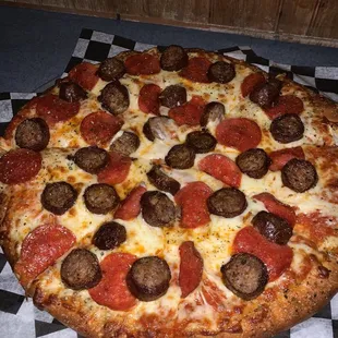 a pepperoni and sausage pizza
