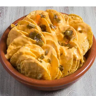 a bowl of chips and cheese