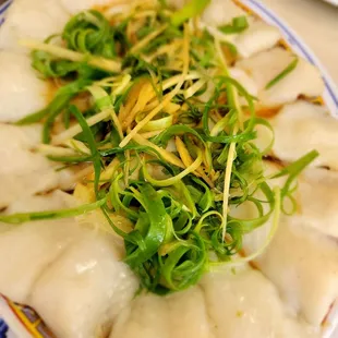 Steamed fish with ginger and onions.